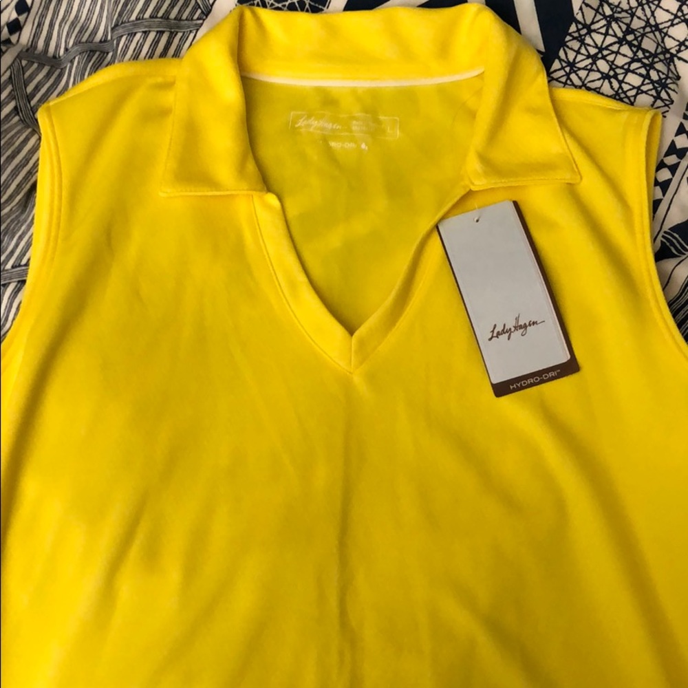 Brand new sleeveless yellow golf polo